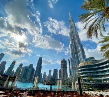 Dubai skyline with Burj Khalifa and palm trees